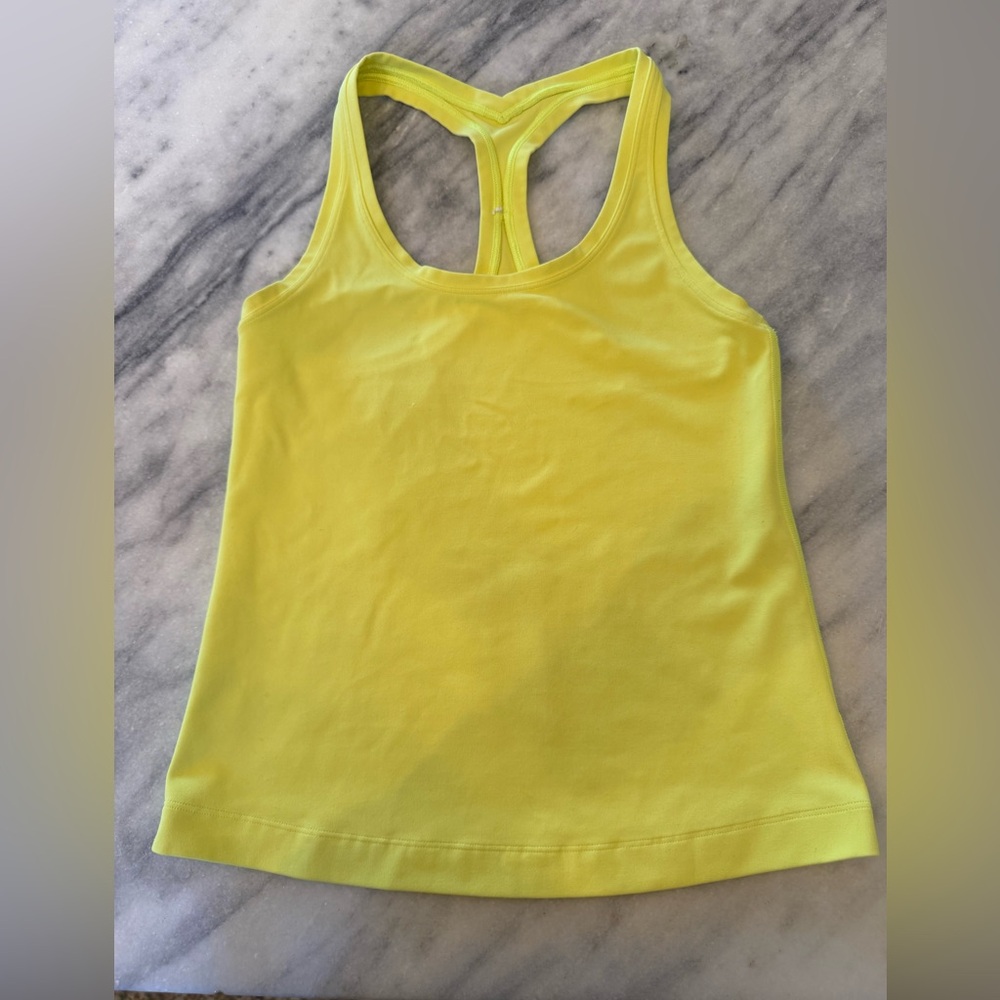 Lululemon Tank Rare/Discontinued. Color cool Razorback. Yellow. Size 4. EUC.